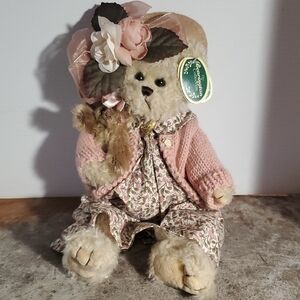 Charming Teddy Bear with Pink Outfit and Floral Hat